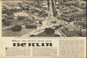 Alte Zeitung mit Schwarz-Weiß-Fotografie eines Stadtpanoramas mit Gebäuden, Bäumen und Fahrzeugen, begleitet von Text.