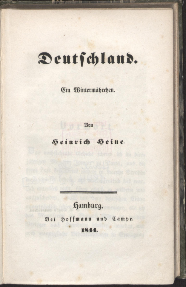 Altes Buch mit dem Titel "Deutschland" auf dem Cover vor einem schwarzen Hintergrund.