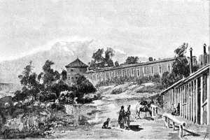 Eine Schwarz-Weiß-Zeichnung einer Gruppe von Menschen, die vor einem Gebäude stehen, umgeben von Bäumen, Hügeln und einem klaren Himmel, mit dem Text 'Das Gefängnis im 19. Jahrhundert' unten.