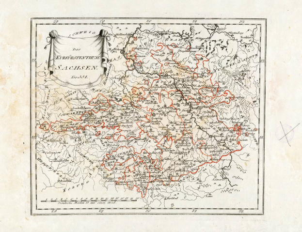 Ein altes Deutschland-Karte mit den Provinzen Sachsen und Sachsen in Rot hervorgehoben, auf textbedrucktem Papier mit einem Wasserzeichen auf der rechten Seite.