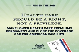 Ein Plakat mit der Aufschrift "Fertigmachen: Gesundheit sollte ein Recht sein, nicht ein Privileg" und einer Karte mit der Aufschrift "Sicherstellen niedrigere Gesundheitskosten und schließen die Versorgungslücke für amerikanische Familien."