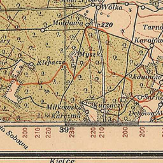 Ein detaillierter alter Stadtplan von Kielce, Polen, der Stra√üen, Geb√§ude und Sehensw√ľrdigkeiten mit Text und Zahlen zur Ortung zeigt.