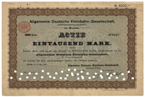 Ein altes deutsches Wertpapier, das von der deutschen Regierung ausgegeben wurde und bedruckten Text sowie einen Stempel enthält.