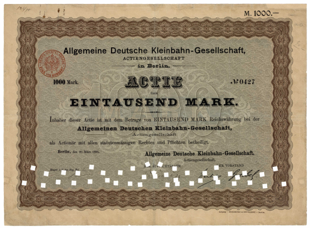 Ein altes deutsches Wertpapier, das von der deutschen Regierung ausgegeben wurde und bedruckten Text sowie einen Stempel enthält.