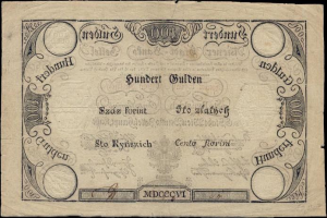 Alte deutsche 100-Pfennig-Banknote mit einem Mann-Porträt auf schwarzem Hintergrund.