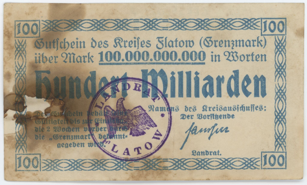 Deutsche Banknote mit "Grenzmark 100,000,000"-Text, zeigt ein purpurfarbenes Stempelabzeichen auf einem weißen Hintergrund.